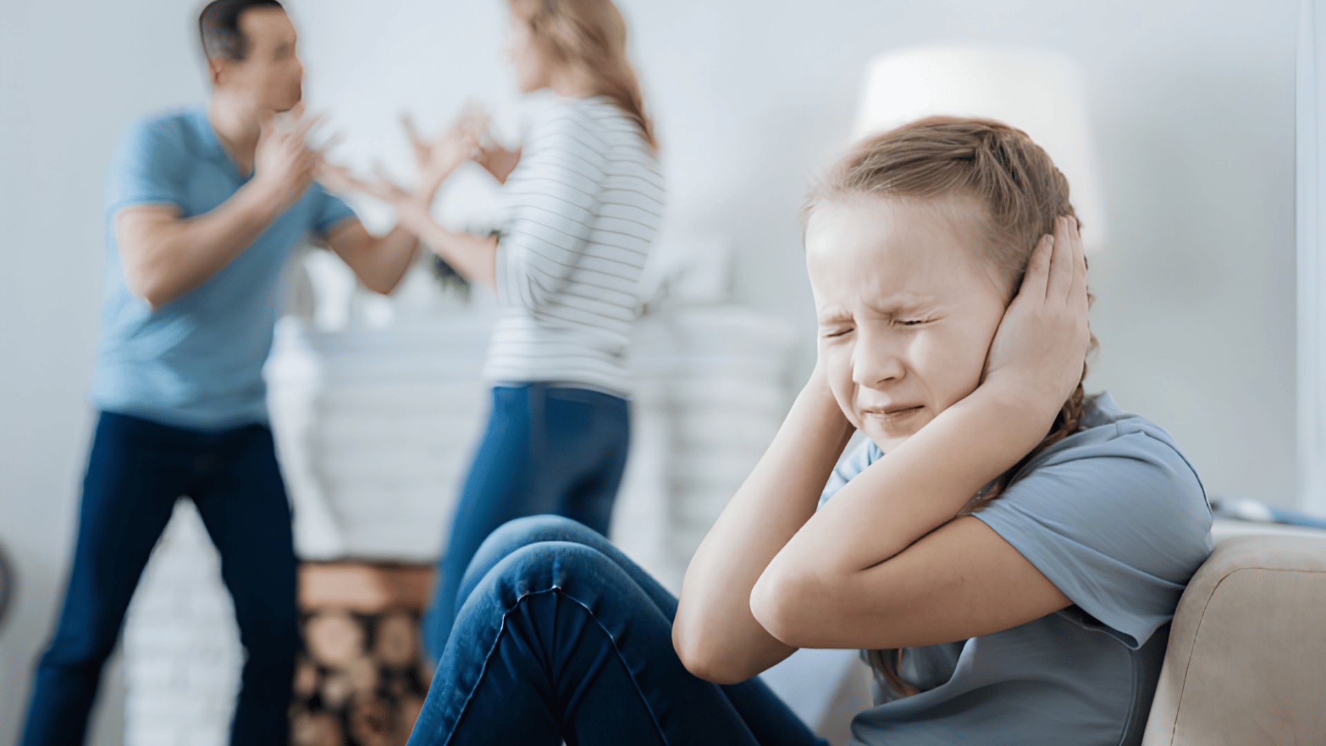 child covering ears while parents argue in background showing family conflict and emotional distress at home