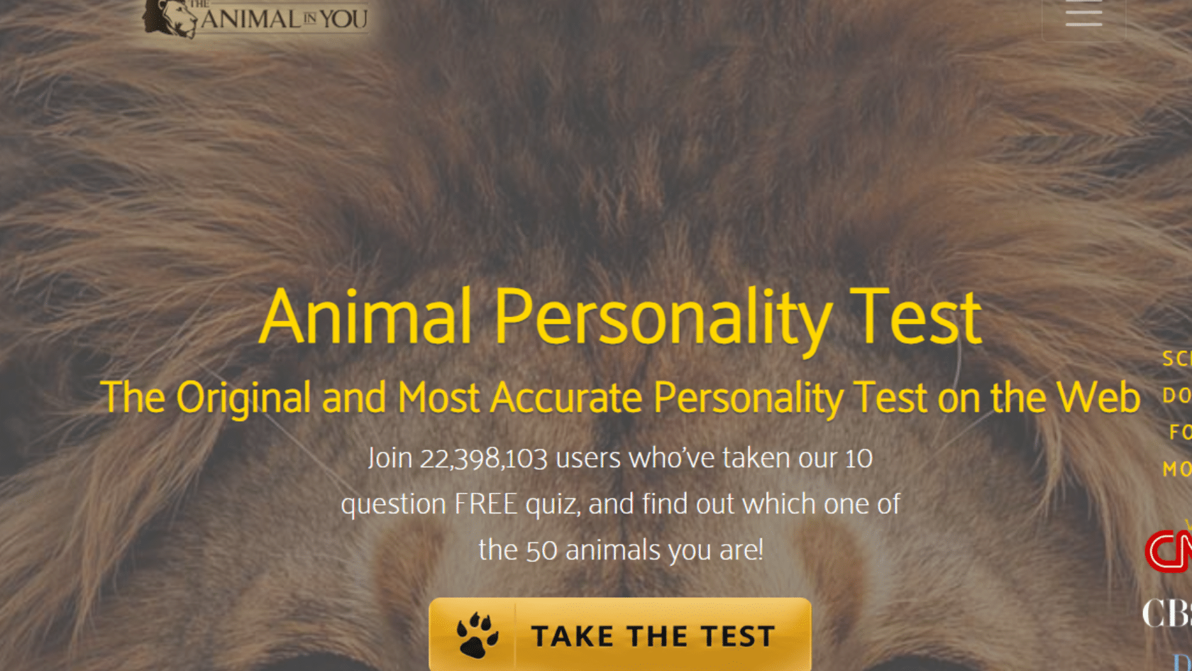 the animal personality test website landing page features a large close up image of a lion with a take the test button