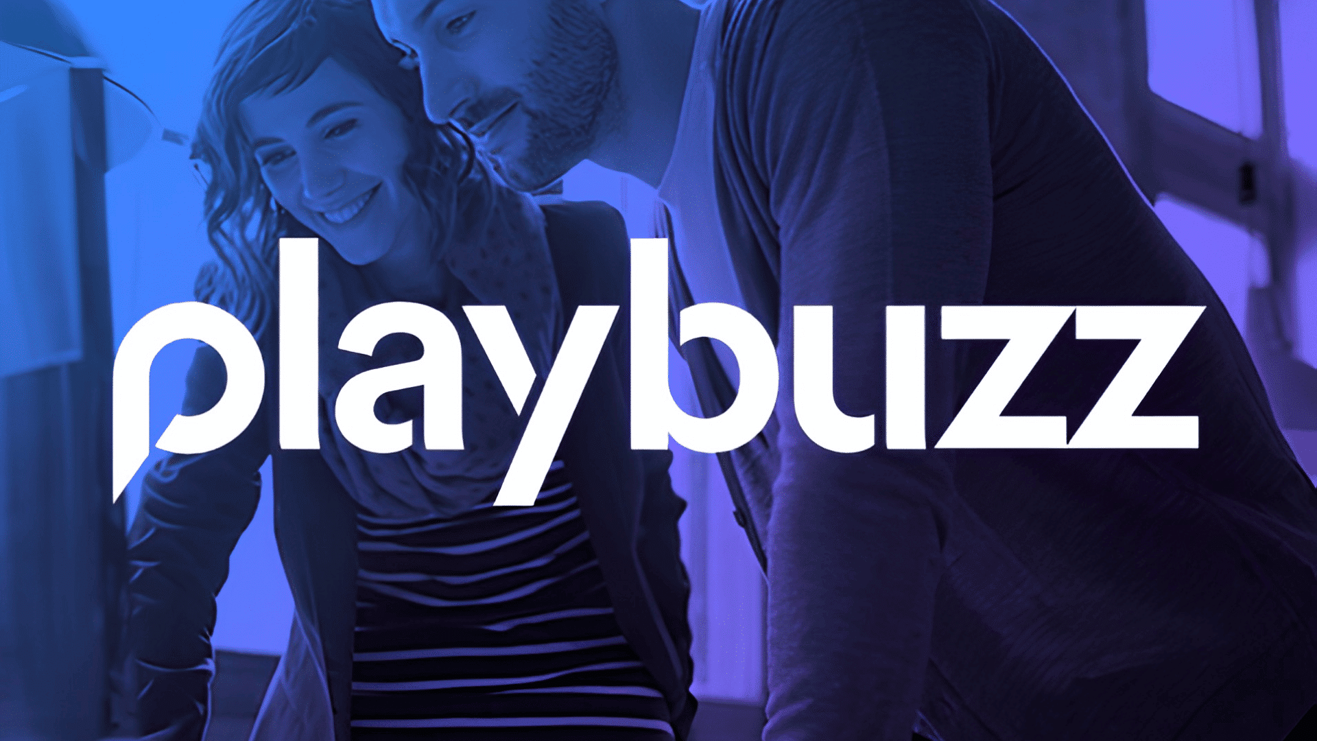 white playbuzz logo text overlaid on a smiling man and woman under blue and purple lighting filters